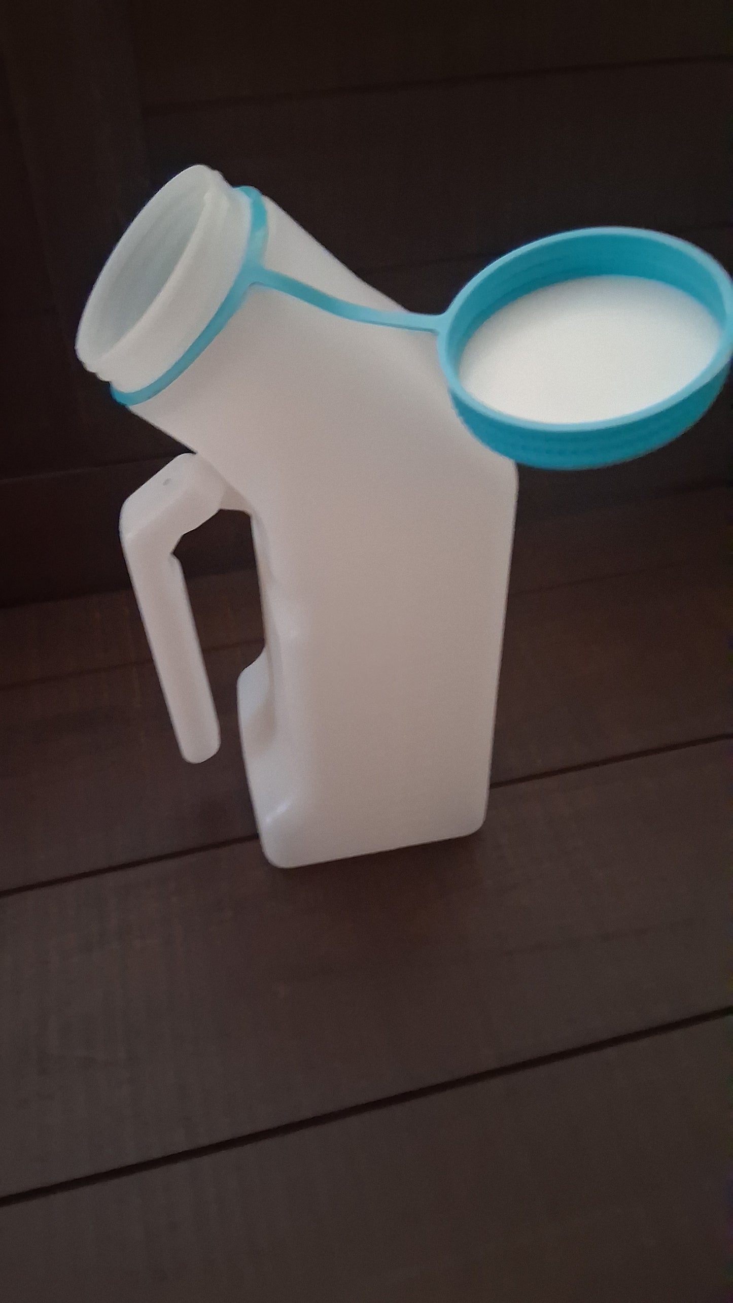 Pee Bottle lid and target are illuminated.Perfect for long trips, hospital stays Sporting events